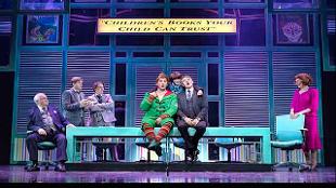 The cast of Elf the Musical on stage at the Dominion Theatre with Simon Lipkin as Buddy, Frankie Treadaway as Michael & Tom Chambers as Walter Hobbs, image courtesy of Mark Senior