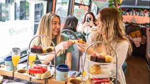 Join friends on a London bus tour with a twist with the Afternoon Tea Bus Tour. © visitlondon.com