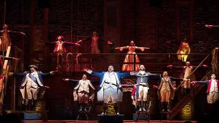 See the story of America and its origins on the backdrop of R'n'B and jazz beats with the award winning musical Hamilton, currently on the London West End. Image courtesy of SEE Tickets/ photo credit Danny Kaan.