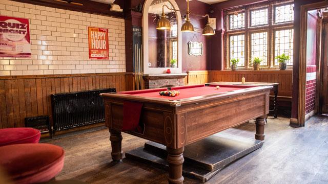 A pool table in the centre of a room. Credit: Nina Paiva. Image courtesy of Rose Pubs Groups A pool table in the centre of a room. Credit: Nina Paiva. Image courtesy of Rose Pubs Groups