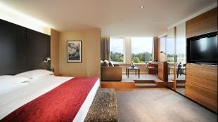 Park Suite bedroom. Image courtesy of the Royal Garden Hotel.