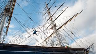Experience panoramic views across London's skyline at the Cutty Sark Rig Climb Experience. Image courtesy of Golden Tours.