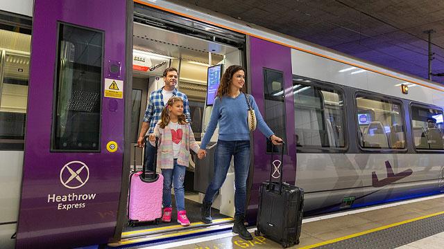 A family stepping off a train. Credit: Laurence Lennard. Image courtesy of Heathrow Airport. A family stepping off a train. Credit: Laurence Lennard. Image courtesy of Heathrow Airport.