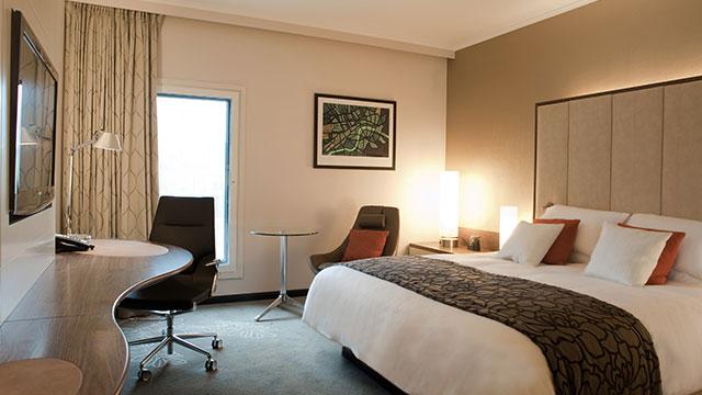 Relax in a spacious double room. Image courtesy of Hilton.