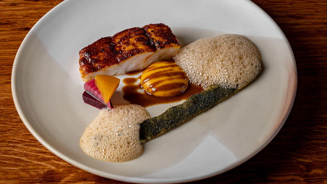 Turbot & egusi miso. Credit: Justin De Souza. Image courtesy of Lotus Land Agency.