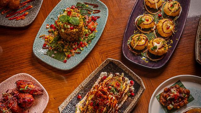 Plates of street food. Image courtesy of MW Eat.