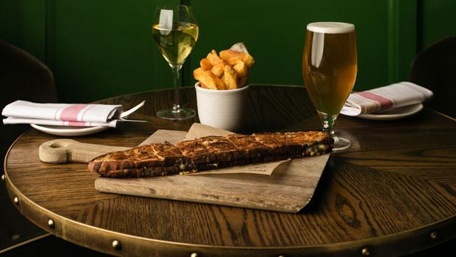 Toastie and a pint. Credit: Raffaella Bichiri. Image courtesy of Langham Hotels.