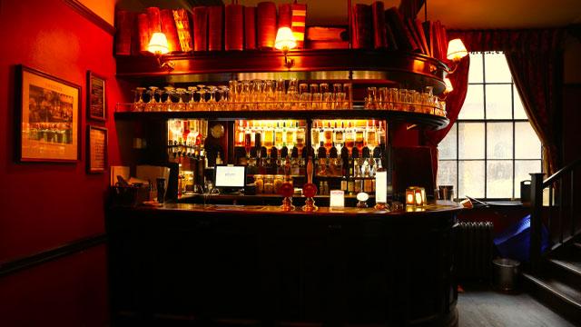 Ye A bar inside the pub. Image courtesy of Ye Olde Cheshire Cheese. Ye A bar inside the pub. Image courtesy of Ye Olde Cheshire Cheese.