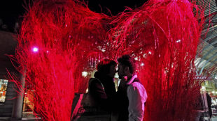 Couple kissing in Covent Garden