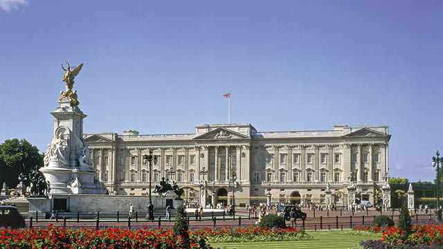 Buckingham Palace with flowers in the foreground